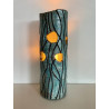 Beautiful raku cracks and a glossy glaze give it its elegance. A unique piece