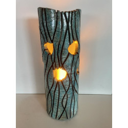 Beautiful raku cracks and a glossy glaze give it its elegance. A unique piece