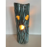 Beautiful raku cracks and a glossy glaze give it its elegance. A unique piece