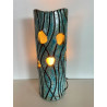 Beautiful raku cracks and a glossy glaze give it its elegance. A unique piece