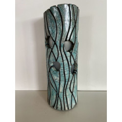 Beautiful raku cracks and a glossy glaze give it its elegance. A unique piece