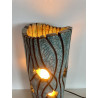 Beautiful raku cracks and a glossy glaze give it its elegance. A unique piece