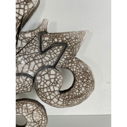 Magnifique pendule murale en céramique raku blanc brillant