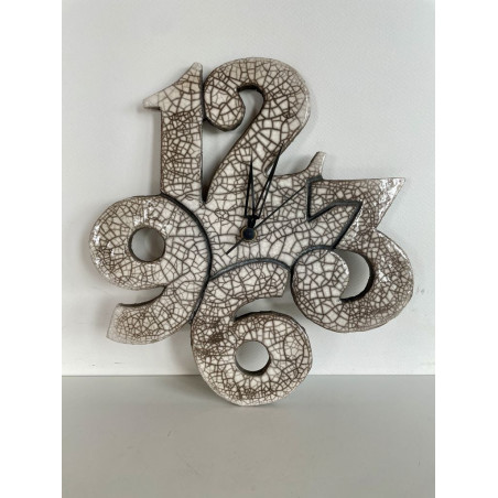 Magnifique pendule murale en céramique raku blanc brillant